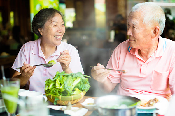 Asian people eating healthy food